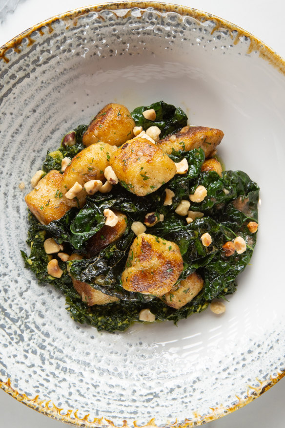 Gnocchi with toasty hazelnuts and buttered cavolo nero.