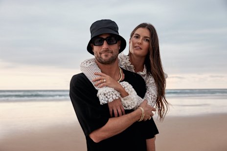 Each successful in their own right, Paul and Chloe Fisher are even stronger together. Paul wears Nique “Yosshi” T-shirt and “Berliner” jeans. Chloe wears 
Ixiah “Luana” bodice; Bondi Born 
“Tatiana” bikini bottom.