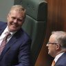 Speaker Tony Smith speaks with Opposition Leader Anthony Albanese during Question Time.