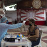 Bolsonaro calls halt of Brazil's Chinese vaccine trial a victory