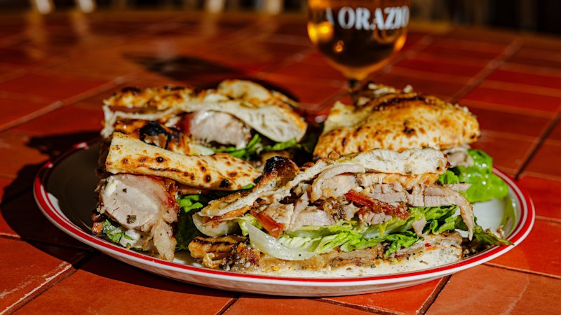 When this four-person pizza sandwich lands, it’s met with a 