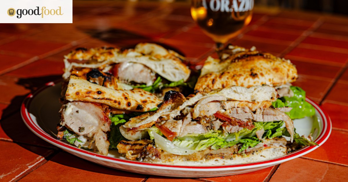 When this four-person pizza sandwich lands, it’s met with a primal grunt