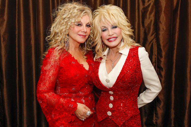 Stella Parton and Dolly Parton attend Stella Parton’s Red Tent Women’s Conference 2014 at the Doubletree Hotel Downtown on April 18, 2014 in Nashville, Tennessee.