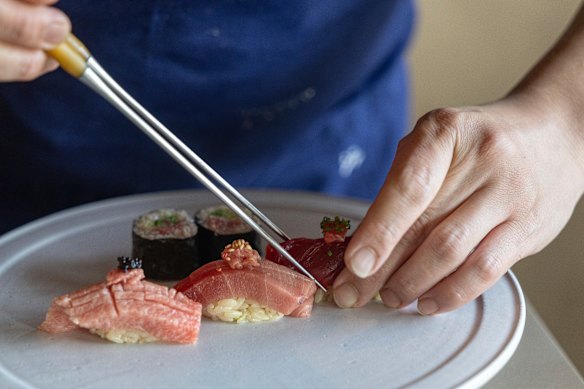 Chef and owner Sangyong Park plates the bluefin tuna set.     
