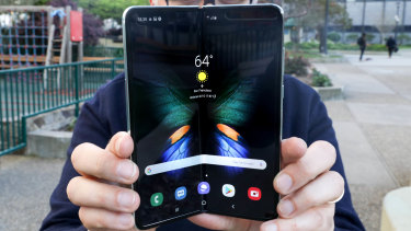 Opening Samsung's Galaxy Fold is a two-handed job, but closing it only takes one.