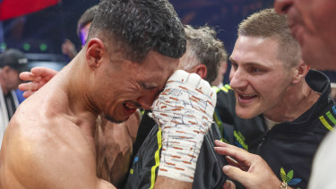 Jai Opetaia breaks down in tears after winning the world title.