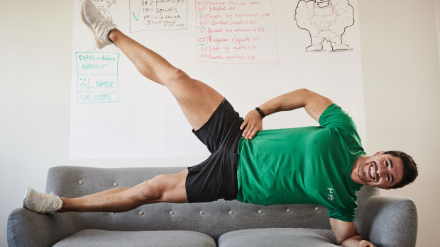 Couch potatoes, move over … Brock Ashby shows his home-based clients how to keep fit using furniture.