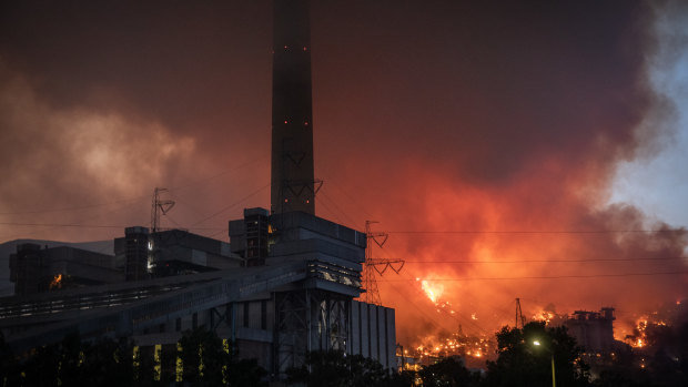 Fires burn at the back of the Kemerkoy Thermal Power Plant in Mugla, Turkey. 