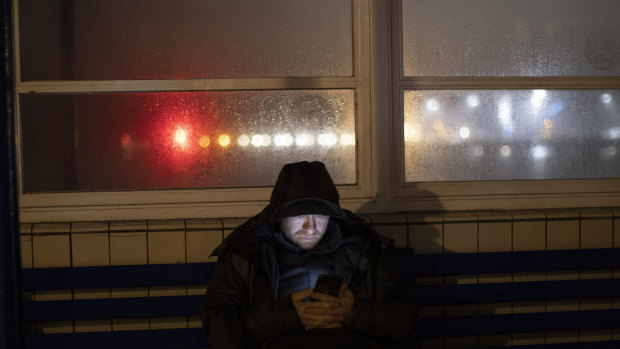 Bulgarian man sits under a shelter on the promenade at the port entrance  in Dover, England. 