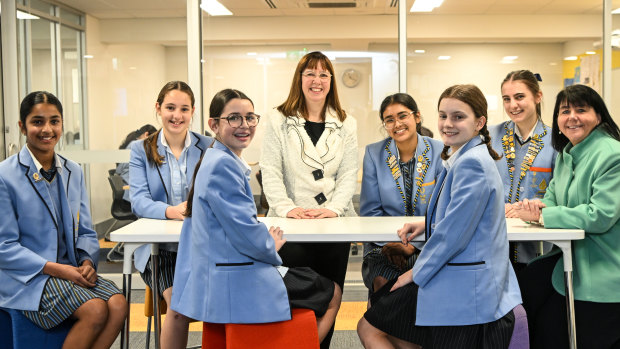 Lowther Hall Anglican Grammar School principal Elisabeth Rhodes (centre) and deputy principal Tracy Healy (right) with students.