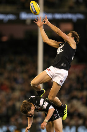 Up there, Charlie: Curnow marks over Tom Langdon.
