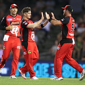 Having a ball: Leg-spinner Cameron Boyce (middle) celebrates a wicket for the Renegades.