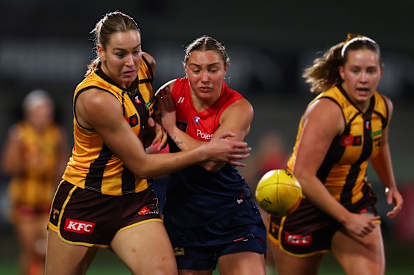Carter says AFLW salaries are a burden for the competition. 