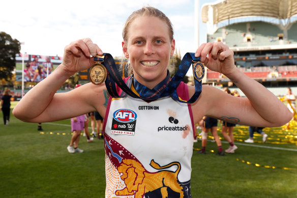 Brisbane’s Kate Lutkins celebrates after being named player of the match in Saturday’s grand final triumph over Adelaide.