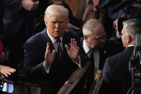 President Donald Trump leaves after addressing the joint session of Congress.