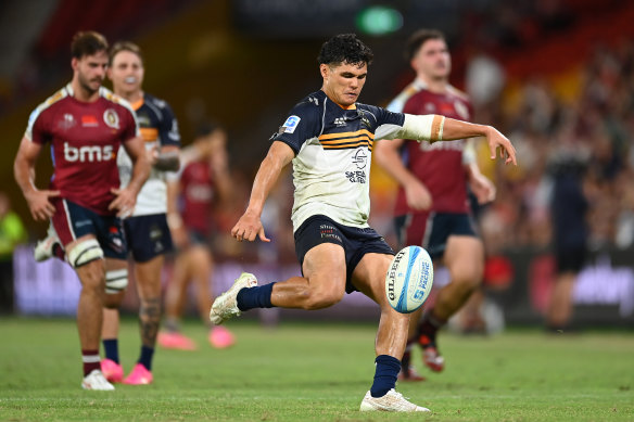 Noah Lolesio of the Brumbies kicks the ball out of play to secure his team’s victory.