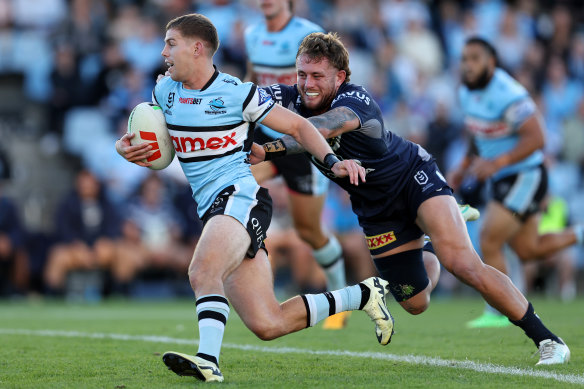 Blayke Brailey runs the ball against the Cowboys.