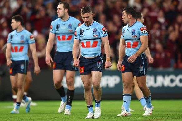 Dejected Blues players after losing the series at Suncorp Stadium.