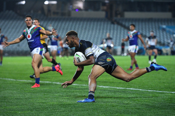 Debutant Hamiso Tabuai-Fidow crosses over for a try that was disallowed during their loss to the New Zealand Warriors at Central Coast Stadium in Gosford last Friday.