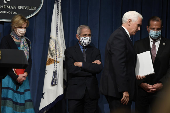 Vice-President Mike Pence leaves Friday's briefing with the White House's Coronavirus Taskforce.