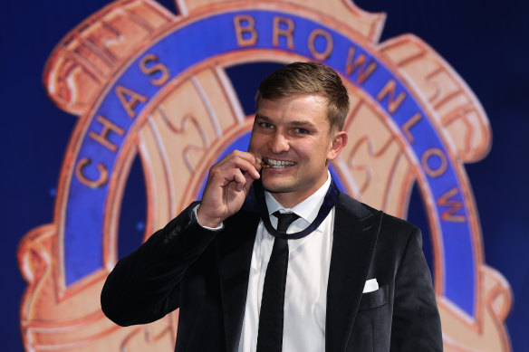 Ollie Wines of Port Adelaide poses after winning the 2021 Brownlow Medal. 
