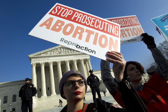 Abortion rights activists protest at the US Supreme Court during the March for Life in Washington. 