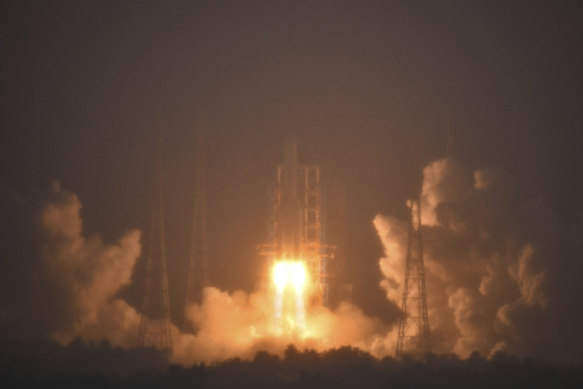 A rocket carrying the Chang’e-6 spacecraft launches in China last month.