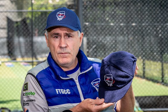 Lee Thompson, president of Ferntree Gully Cricket Club, holding a cap which was presented to Ben before his debut game. 