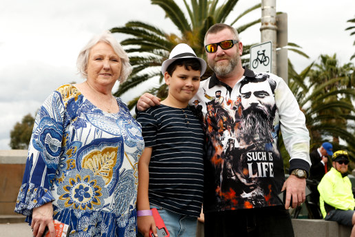 First time in Melbourne: Karen Dryden, grandson Tyrone Norris, 11, and son Michael Norris at Princes Bridge.