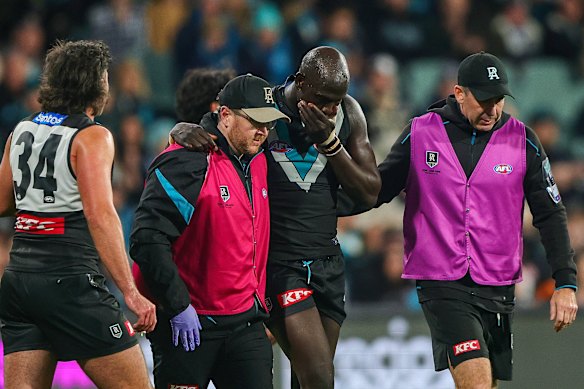 Aliir Aliir had to be helped from the ground after an incident with Jacob van Rooyen.