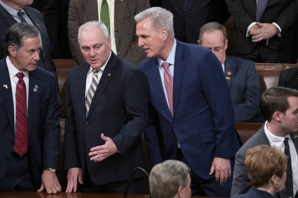 House Republican Leader Kevin McCarthy confers with Minority Whip Steve Scalise, left, before an address by Ukrainian President Volodymyr Zelensky in the House chamber, at the Capitol in Washington in December.