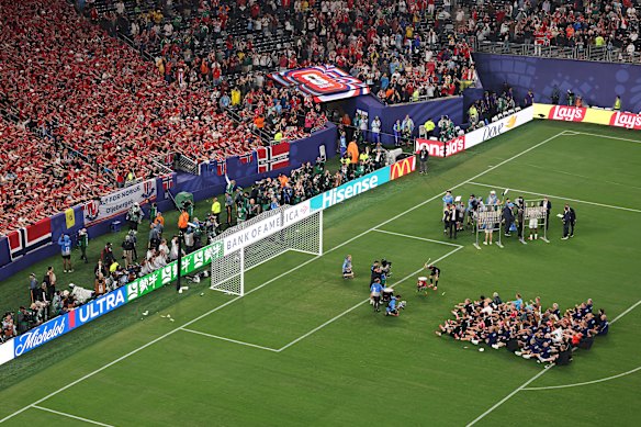 The crowd joined in. 