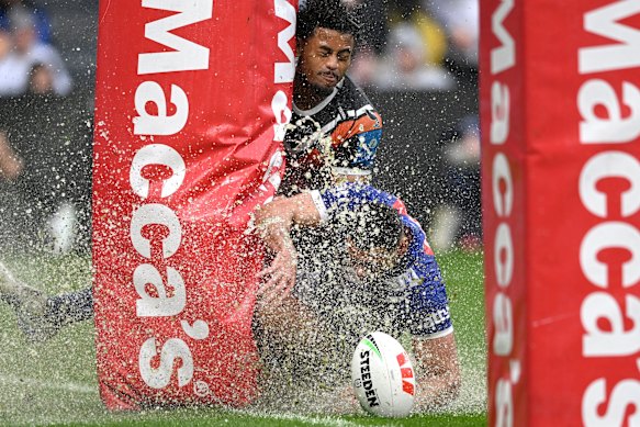 Splish splash: The Dogs have lost all three games on a boggy playing surface.