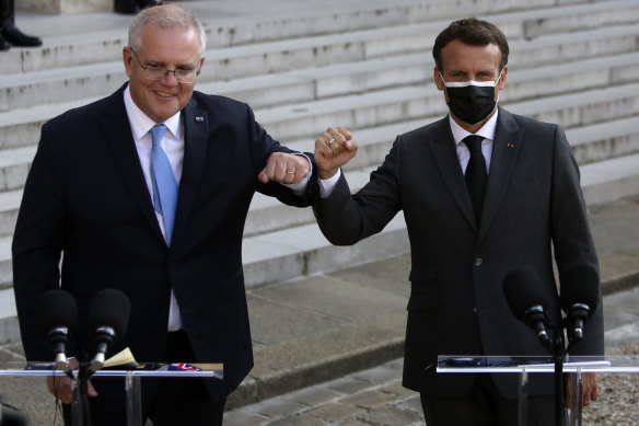 Prime Minister Scott Morrison with French President Emmanuel Macron in Paris in June. Morrison says he told Macron the French submarines were not going to suit Australia.