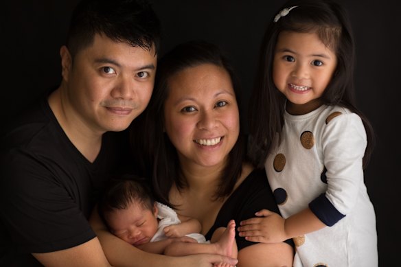 Caitlin Cruz, right, with her parents Mitch, Marie and younger sister Chloe.