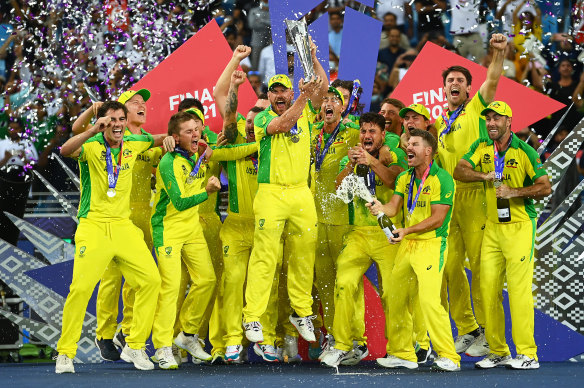 Aaron Finch jumps for joy as he lifts the first T20 World Cup for the Australian men’s team.
