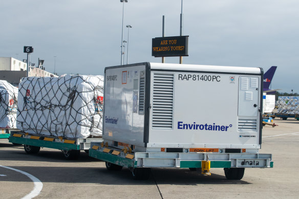 The first vials of the AstraZeneca COVID-19 vaccine arriving at Sydney Airport on Sunday morning.