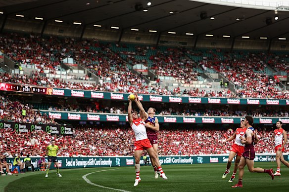 Hayden McLean of the Swans marks at the SCG.