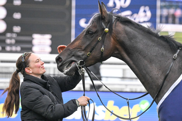 Strapper Sarah Nowland, a professional dancer, with mare Positivity, who ran in the Melbourne Cup.