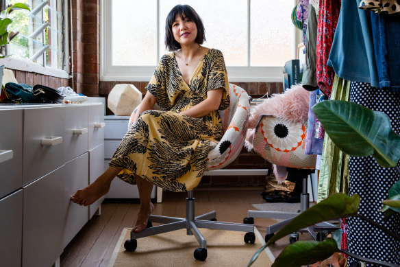 Eco fashion stylist Eve Wong in her front room where she shoots, styles and re-sells preloved clothes.