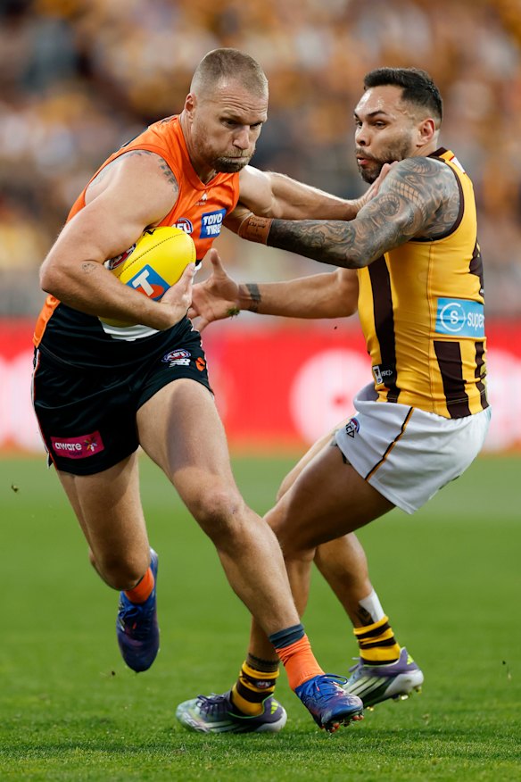 Impey grabs Giants forward Jake Stringer.
