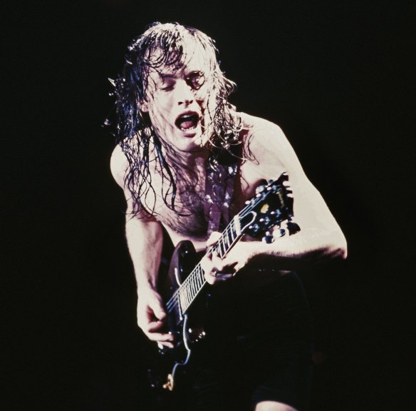 Guitarist Angus Young shreds a solo during a concert on October 18, 1985, at the Forum in Inglewood, California.