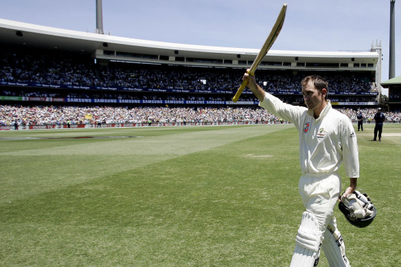 Australian batsman Justin Langer waves his bat to the crowd following their 2007 win over England at the SCG in his final Test match.