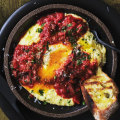 Baked eggs with chorizo, peppers and soft polenta