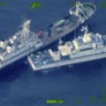 A Chinese militia vessel, top, and Philippine coast guard vessel BRP Cabra as they approach Second Thomas Shoal, locally called Ayungin Shoal, at the disputed South China Sea.