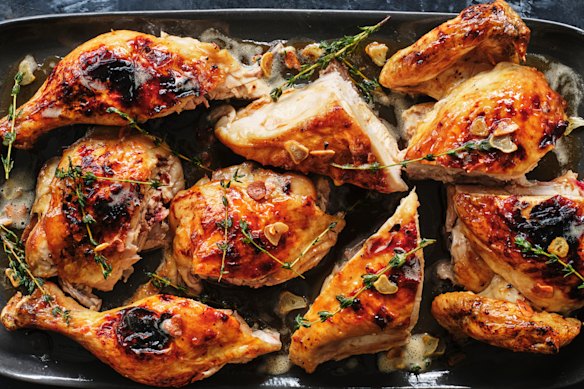 Carve the chicken into eight pieces before pouring the melted butter over.