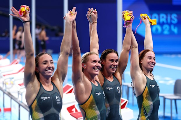 Mollie OCallaghan, Lani Pallister, Brianna Throssell and Ariarne Titmus of Team Australia celebrate after winning gold in the Women's 4x200m Freestyle Relay Final on day six of the Olympic Games Paris 2024 at Paris La Defense Arena on August 01, 2024 in Nanterre, France. 