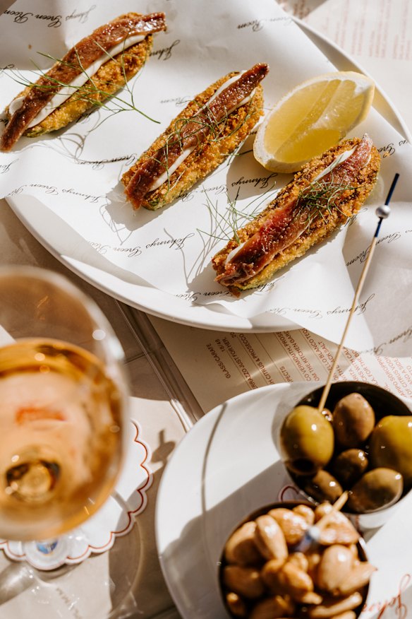 Crumbed and fried zucchini are like canoes for whipped cod roe and anchovy.