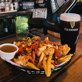 Spice bag and Guinness at Irish Times Pub in the CBD.