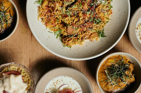 Lamb biryani with accompaniments from a previous Saadi menu.